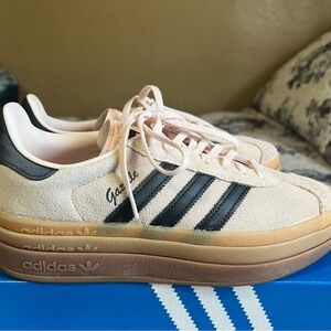 Adidas Cream and Black Sneakers with Iconic Stripes